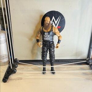 WWE Action Figure with Black and Tan Outfit